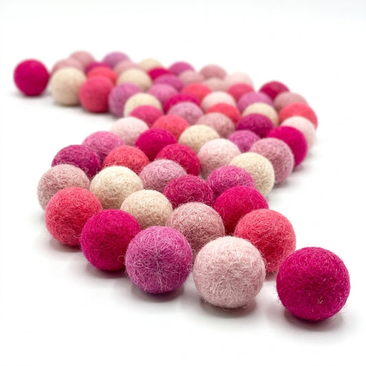Pink wool felt balls for DIY craft supplies and gift toppers also for diy projects