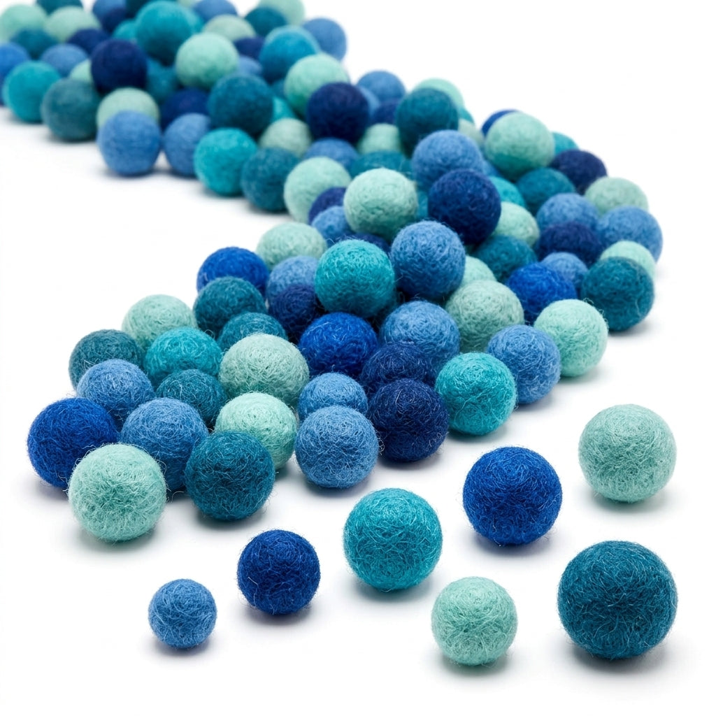 Blue wool felt balls for handmade garlands and decorations or kids dyo projects