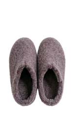 Pair of purple slippers on a white background