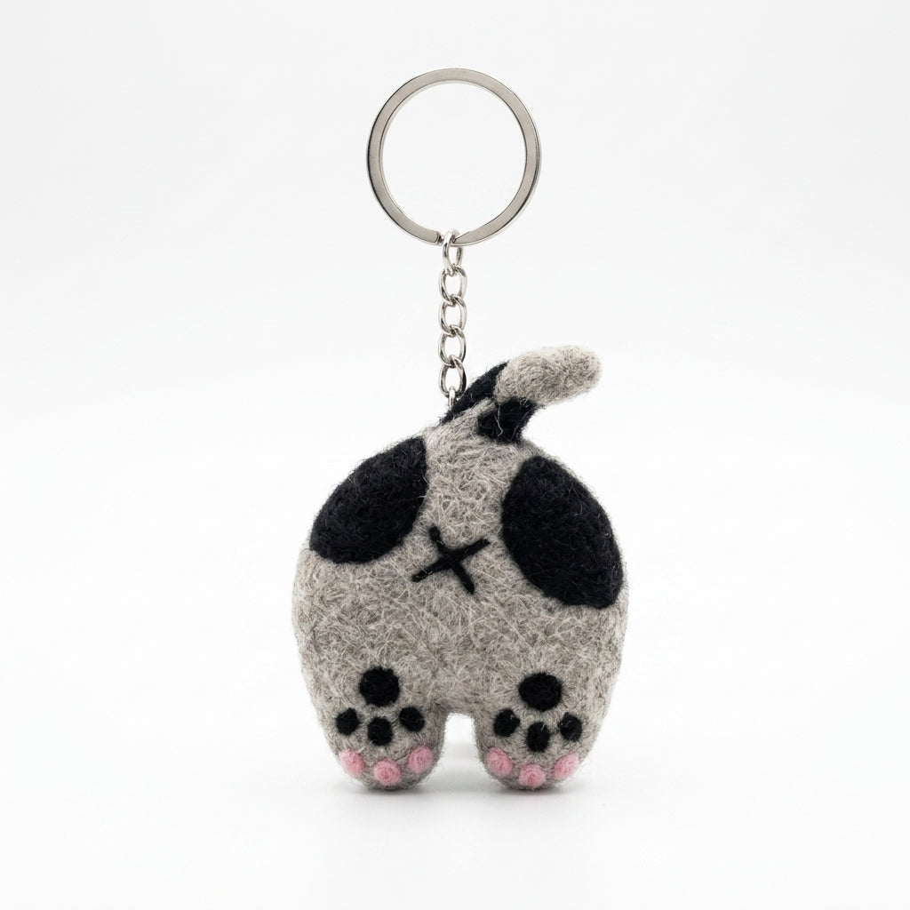 Grey and teal wool felt cat back keyring on a white background