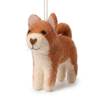 Handmade wool felt orange cat ornament with hanging thread on a white background