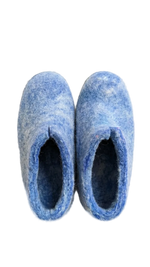 Pair of blue slippers on a white background