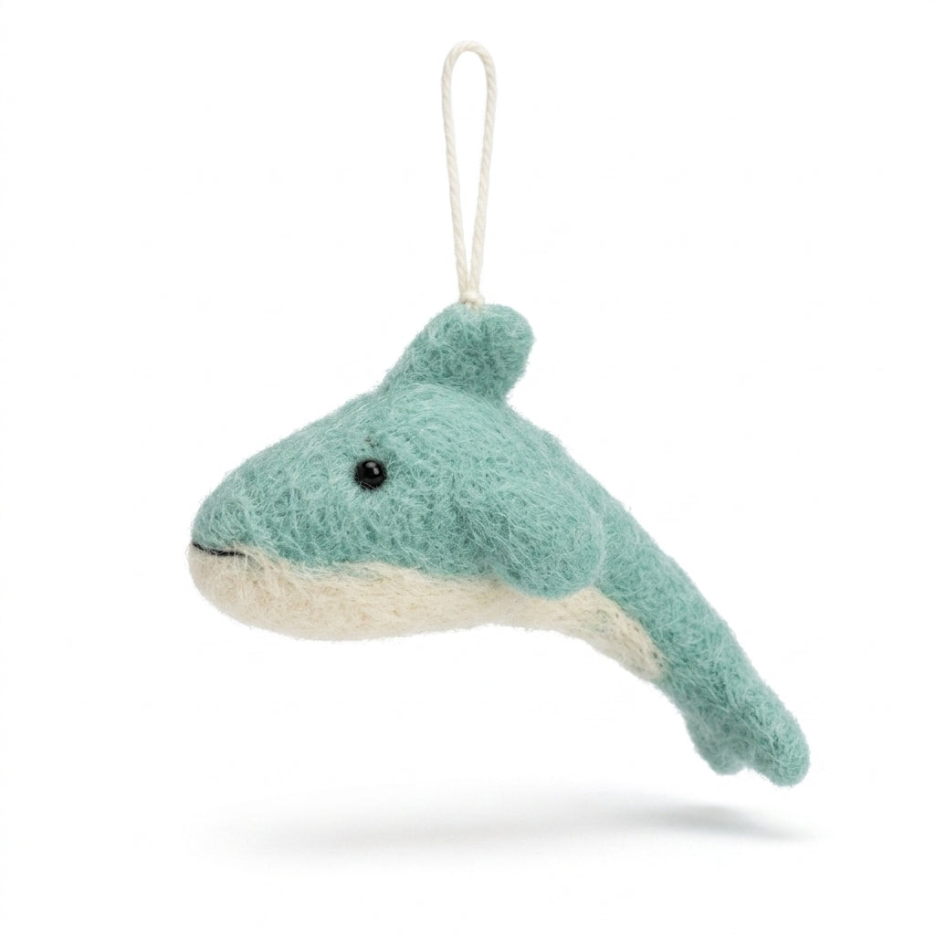 Plush whale ornament with a white background