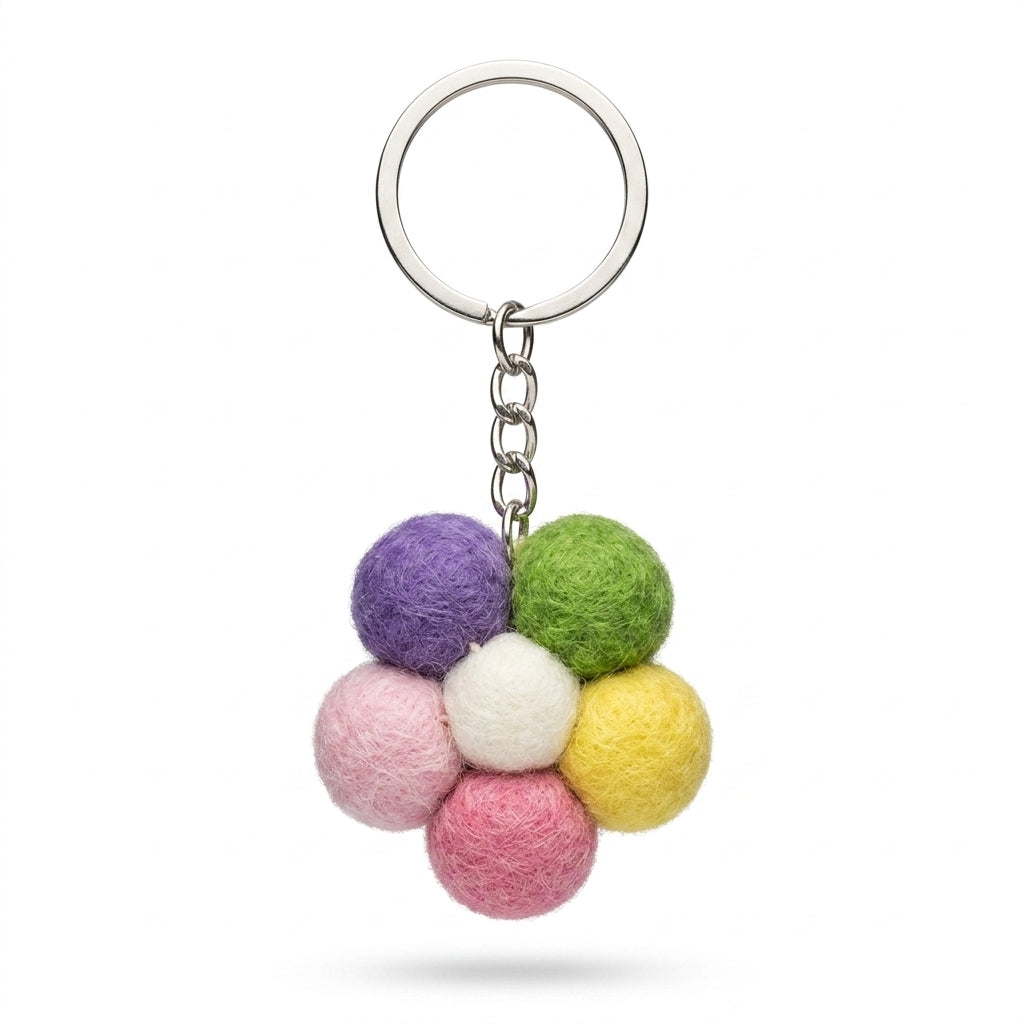 handmade  bag charm Small pastel felt flower keychain with metal keyring ball keychain on a white background