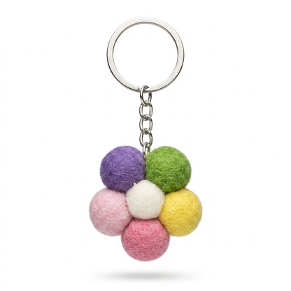 handmade  bag charm Small pastel felt flower keychain with metal keyring ball keychain on a white background