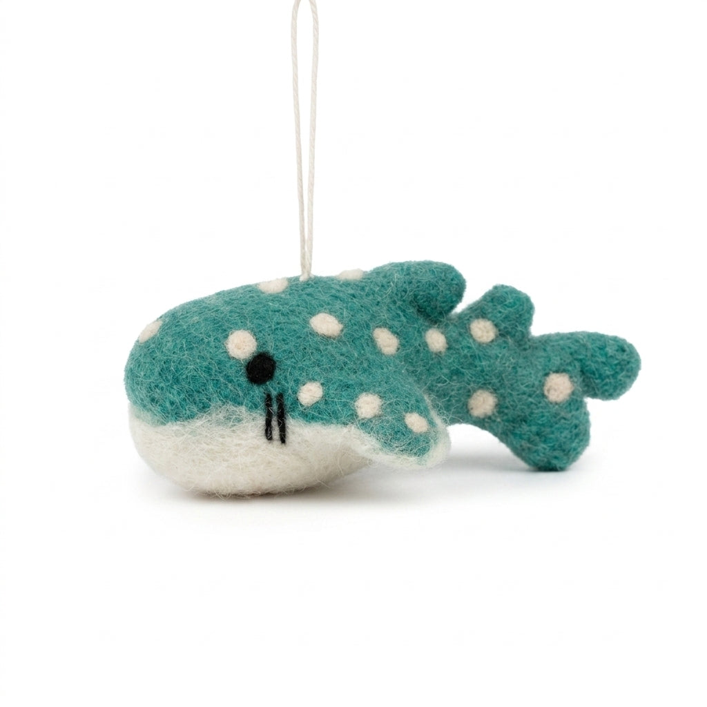 Teal and white polka dot shark plush wool ornament on a white background