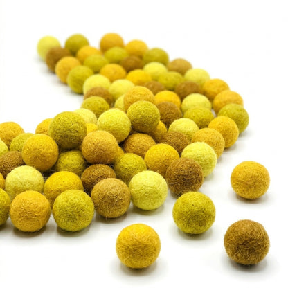 Yellow wool felt balls for colourful handmade craft projects also diy projects