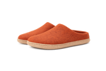 Pair of orange slippers on a white background